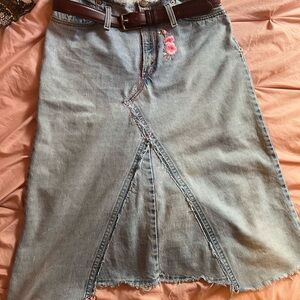 Handmade A-Line Denim Skirt with Cherry Blossom patches and Zipper Closure.